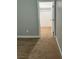 Bedroom leading to a walk-in closet with neutral walls and carpet at 1060 Hall Ave, Pahrump, NV 89048