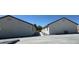 Modern residential units with simple architectural lines and gravel landscaping at 1060 Hall Ave, Pahrump, NV 89048