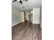Spacious living room open to kitchen and stainless steel refrigerator at 1060 Hall Ave, Pahrump, NV 89048