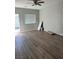 Bright, open living area with laminate floors and neutral wall colors at 1060 Hall Ave, Pahrump, NV 89048