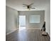 View of open living area with modern ceiling fan and natural light at 1060 Hall Ave, Pahrump, NV 89048