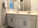 Bathroom featuring a double sink vanity with modern faucets and plenty of storage at 1064 Blue Wine Ct, Henderson, NV 89002