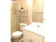 Bright and clean bathroom with a shower, toilet, and white vanity, offering a functional space at 1064 Blue Wine Ct, Henderson, NV 89002
