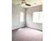 Bright, spacious bedroom featuring two windows and a ceiling fan at 1064 Blue Wine Ct, Henderson, NV 89002