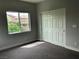 Cozy bedroom featuring a window and closet at 1064 Blue Wine Ct, Henderson, NV 89002