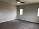 Bright carpeted bedroom with neutral walls and multiple windows offering ample natural light at 1064 Blue Wine Ct, Henderson, NV 89002