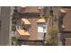 Aerial view of a property showcasing the roof, landscaping, and nearby street access in a residential neighborhood at 10717 Grand Cypress Ave, Las Vegas, NV 89134