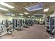 Community fitness center with mirrored wall and various weight machines at 10717 Grand Cypress Ave, Las Vegas, NV 89134