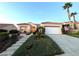 Charming single-story home with well-manicured landscaping and two-car garage at 10717 Grand Cypress Ave, Las Vegas, NV 89134
