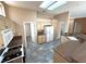 Well-equipped kitchen boasts ample cabinet space, granite countertops, and modern appliances at 10717 Grand Cypress Ave, Las Vegas, NV 89134