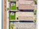 An aerial view shows the well-manicured backyards of these attached homes at 10979 Bristol Park Ave, Las Vegas, NV 89166