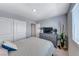 Bedroom with window view and closet at 10979 Bristol Park Ave, Las Vegas, NV 89166