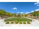 Scenic community green space with manicured lawn, landscaping, and nearby residences at 10979 Bristol Park Ave, Las Vegas, NV 89166