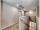 Bright hallway leads to bedrooms, showcasing neutral tones and clean design at 10979 Bristol Park Ave, Las Vegas, NV 89166