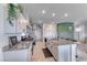 A kitchen features granite countertops, stainless steel appliances, and white cabinets at 10979 Bristol Park Ave, Las Vegas, NV 89166