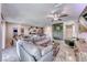 Open living area with modern kitchen, dining space, and cozy living room layout at 10979 Bristol Park Ave, Las Vegas, NV 89166