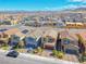 Charming two-story homes line a street with mountain views in a vibrant community at 10979 Bristol Park Ave, Las Vegas, NV 89166