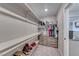 Spacious walk-in closet boasts ample storage with shelves and drawers at 10979 Bristol Park Ave, Las Vegas, NV 89166