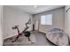 Workout room with bike, mirror, and bean bag at 10979 Bristol Park Ave, Las Vegas, NV 89166