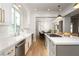 Stylish kitchen featuring stainless appliances and an open layout at 11830 Kingsbarns Ct, Las Vegas, NV 89141