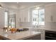 Modern kitchen with stainless steel appliances and white cabinets at 11830 Kingsbarns Ct, Las Vegas, NV 89141
