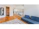 The upstairs hallway has wood floors, and access to the bedrooms at 1291 Rolling Sunset St, Henderson, NV 89052