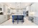 Bright kitchen featuring stainless steel appliances, a center island, and granite countertops at 1291 Rolling Sunset St, Henderson, NV 89052