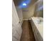 Well-lit bathroom with a large vanity, a vessel sink, and a neutral tile floor at 137 Coronation Ave, Las Vegas, NV 89123