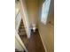 Half bathroom with tile floors located near the stairs at 137 Coronation Ave, Las Vegas, NV 89123