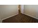 Bright bedroom with neutral paint, plush carpet, and a standard door at 137 Coronation Ave, Las Vegas, NV 89123