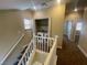 Stairwell landing featuring a washer and dryer closet at 137 Coronation Ave, Las Vegas, NV 89123
