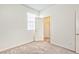 Cozy bedroom with a window, closet, neutral walls, and soft carpeting at 156 Fulgora St, Henderson, NV 89074