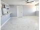 Bright living area featuring marble floors and modern ceiling fan at 1836 Mcdaniel St, North Las Vegas, NV 89030