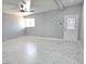 Spacious living room with marble floors, natural light, and modern fixtures at 1836 Mcdaniel St, North Las Vegas, NV 89030