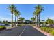 Beautifully landscaped entrance to a spacious clubhouse with ample parking at 2103 Poppywood Ave, Henderson, NV 89012