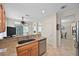 Functional kitchen featuring granite counters, stainless steel appliances, and an open layout at 2103 Poppywood Ave, Henderson, NV 89012