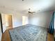 Spacious bedroom with ceiling fan, wood flooring, and lots of closet space at 2138 Fort Halifax St, Henderson, NV 89052