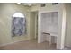Cozy bedroom featuring tile floors, built in desk area, and a large window at 2138 Fort Halifax St, Henderson, NV 89052