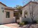 A private courtyard features a metal gate and manicured desert landscaping at 2138 Fort Halifax St, Henderson, NV 89052
