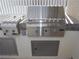 Outdoor kitchen featuring stainless steel grill and counter, perfect for barbecues and outdoor dining at 2138 Fort Halifax St, Henderson, NV 89052
