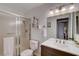 Bathroom featuring a glass door shower, updated vanity, and modern fixtures at 227 N Lamb Blvd # B, Las Vegas, NV 89110