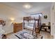 room featuring bunk beds, a play area, and ample storage at 227 N Lamb Blvd # B, Las Vegas, NV 89110
