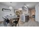 Light-filled dining area adjoining kitchen and featuring a hanging pendant light fixture at 227 N Lamb Blvd # B, Las Vegas, NV 89110