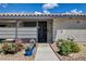 Charming single-story home showcasing a landscaped front yard with a sidewalk at 227 N Lamb Blvd # B, Las Vegas, NV 89110