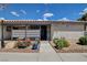 Charming single-story home featuring a landscaped front yard with a sidewalk at 227 N Lamb Blvd # B, Las Vegas, NV 89110