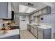 Modern kitchen with stainless steel appliances, stylish backsplash, and ample counter space at 227 N Lamb Blvd # B, Las Vegas, NV 89110