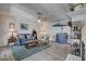 Inviting living room with ceiling fan, wood-look flooring, and stylish decor at 227 N Lamb Blvd # B, Las Vegas, NV 89110