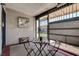 Private covered patio with cozy seating and decorative bars at 227 N Lamb Blvd # B, Las Vegas, NV 89110