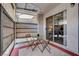 Private covered patio with outdoor seating, offering a peaceful retreat at 227 N Lamb Blvd # B, Las Vegas, NV 89110