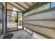 Enclosed patio featuring textured walls and an exterior gate for added security at 227 N Lamb Blvd # B, Las Vegas, NV 89110
